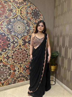 Black draped saree with hand-embroidered blouse
